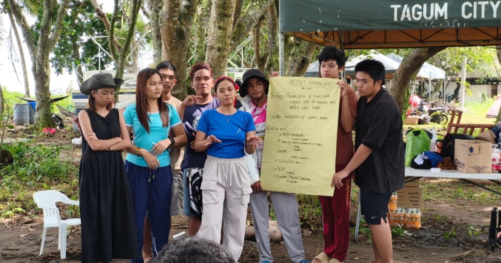 Youth participants presenting their community action plans during Mangrove Camp 2026.