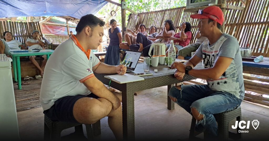 JCI Davao members engaging with TAMFIAS fisherfolk during Project Grab Crab community project.