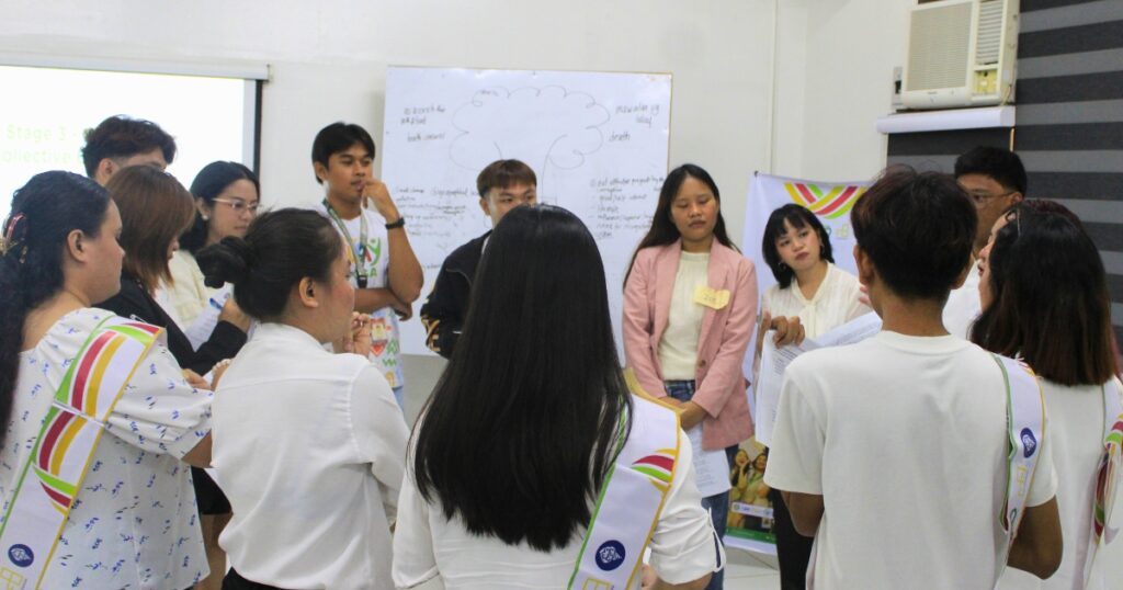 Young leaders participating in a leadership development activity during the Tagum Young Bridging Leaders Fellowship.